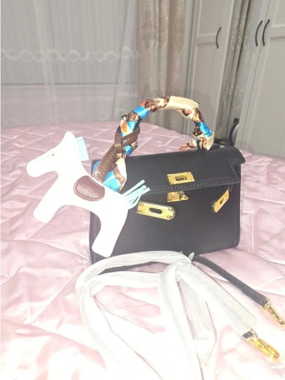 Classic Black Top-Handle Leather Bag with Gold Hardware